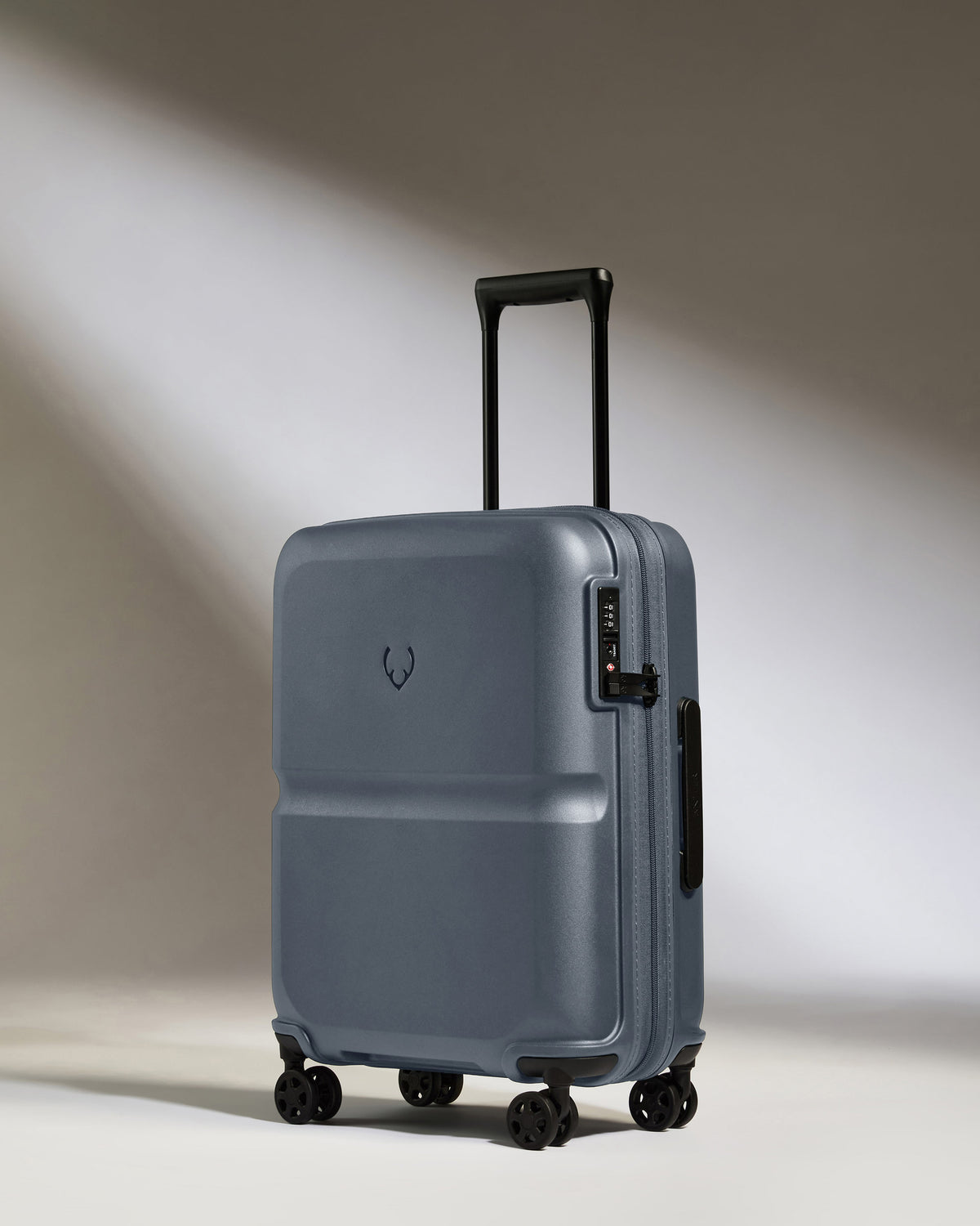 a blue suitcase with wheels