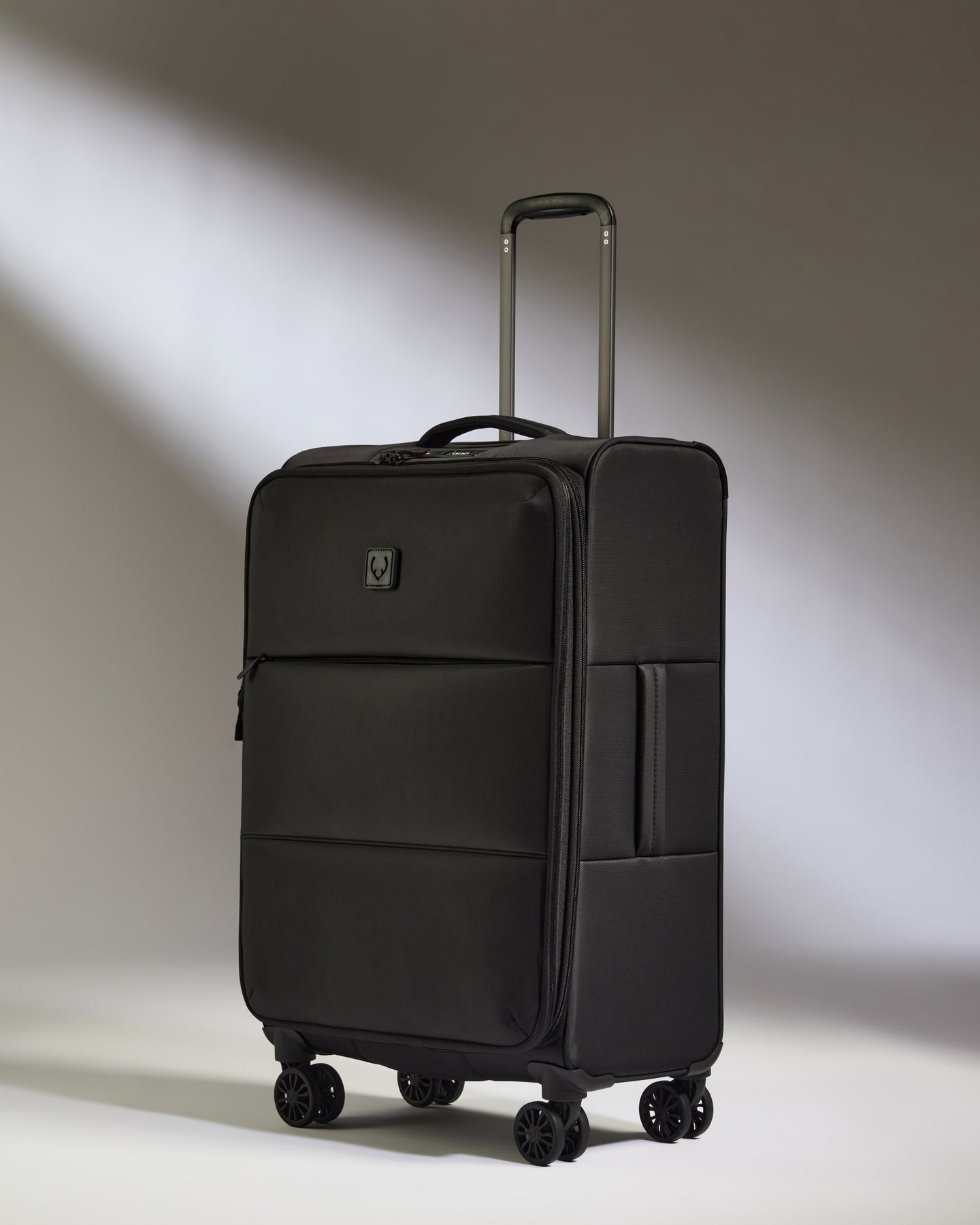Lightest Medium Suitcase in Black - Soft Stripe 2.0