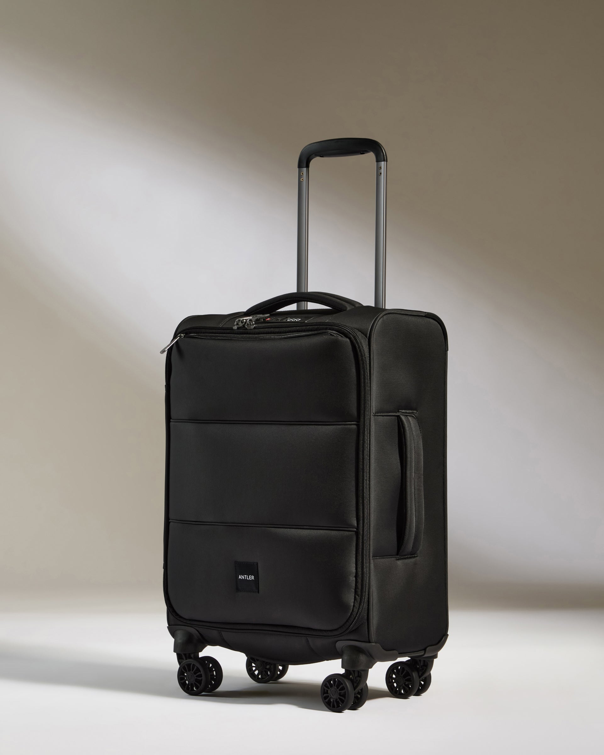 Lightest Cabin Suitcase in Black Soft Stripe