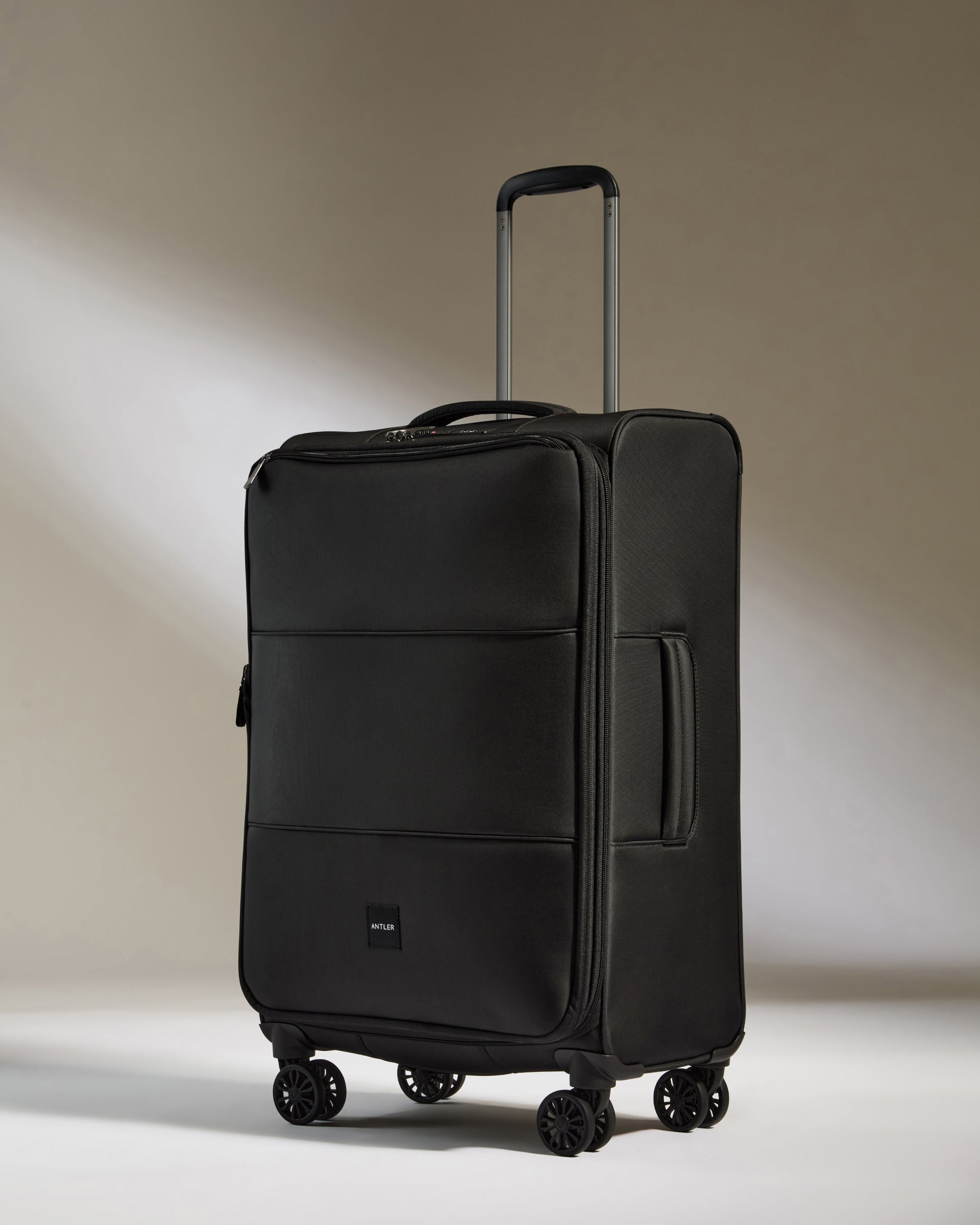 Black medium suitcase on sale