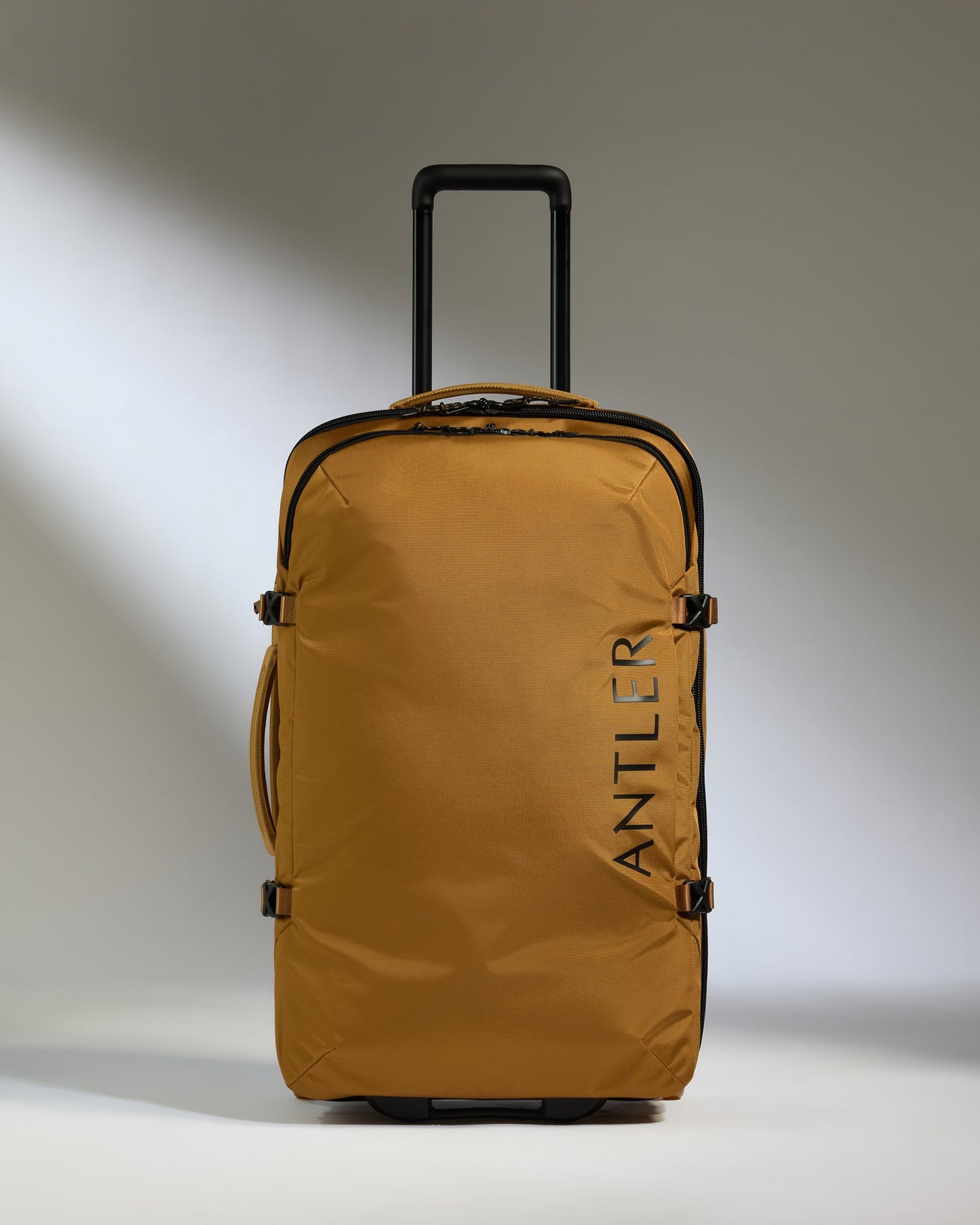 Discovery Wheeled Duffel in Mustard Yellow