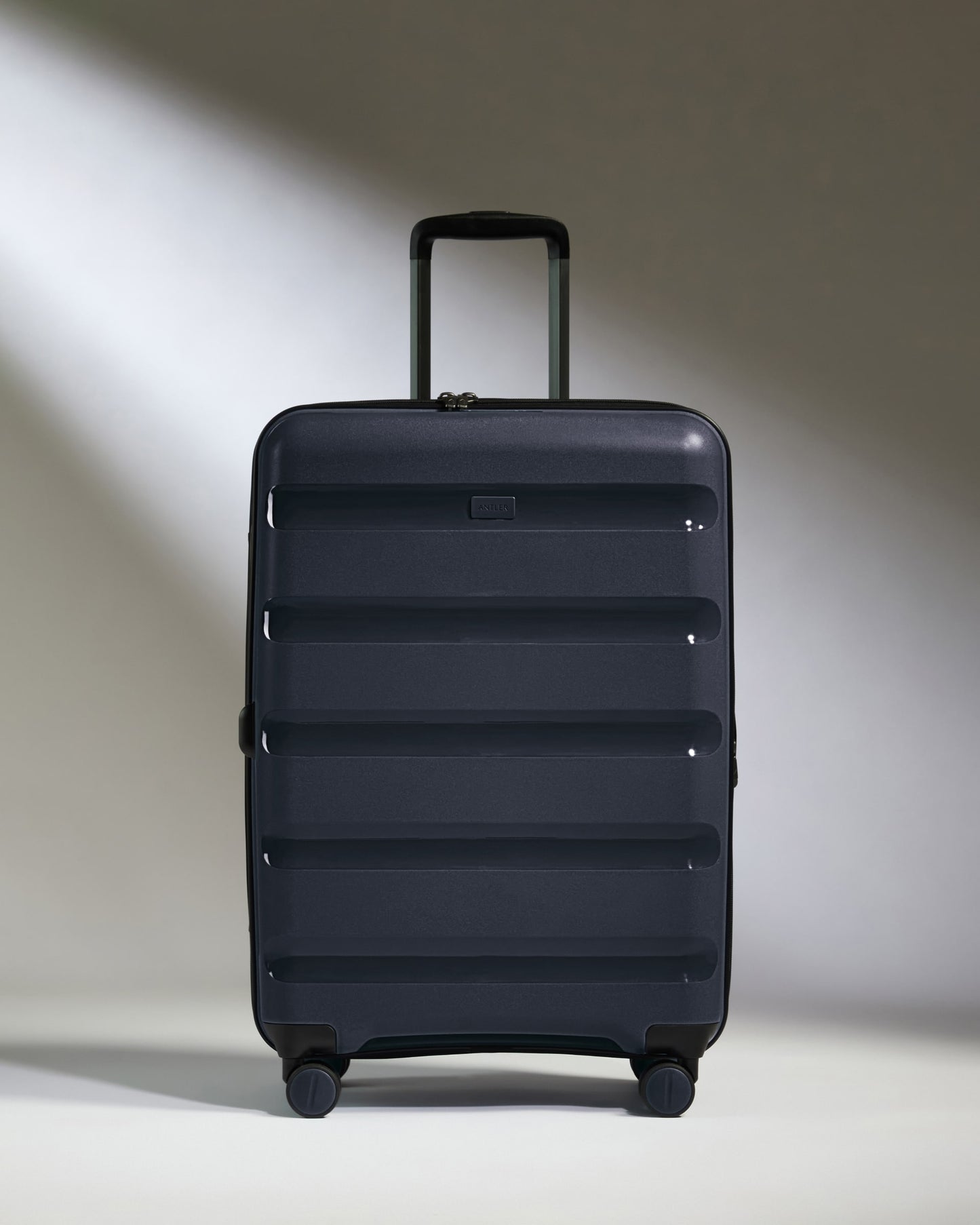 Medium Suitcase in Navy - Logo Stripe