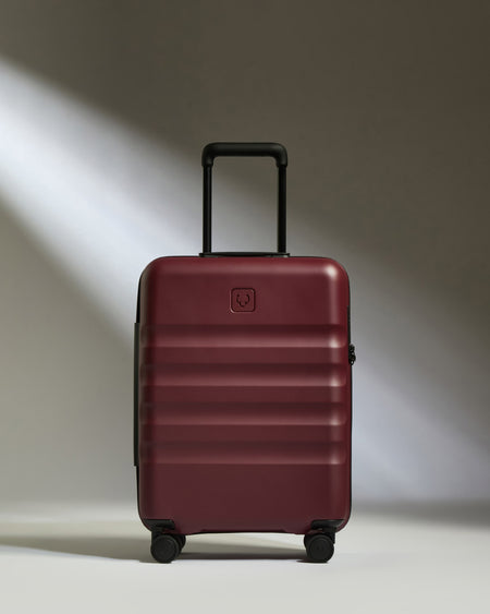 Cabin Suitcase in Cedar Red - Icon Stripe