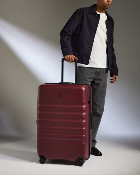 Large Suitcase in Cedar Red - Icon Stripe