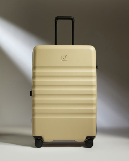 Large Suitcase in Dune Yellow - Icon Stripe