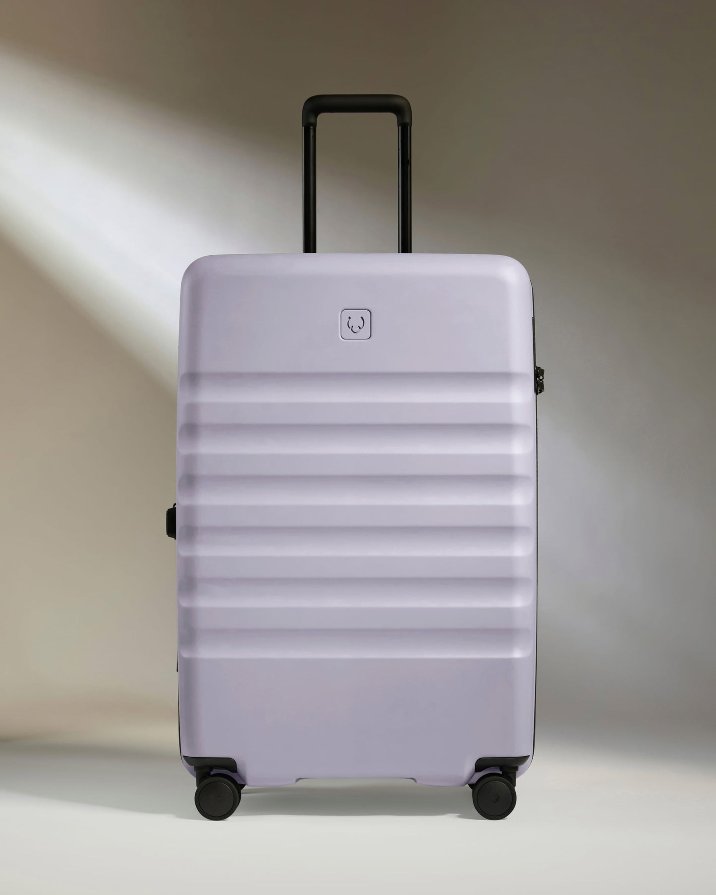 Large Suitcase in Meadow Purple - Icon Stripe