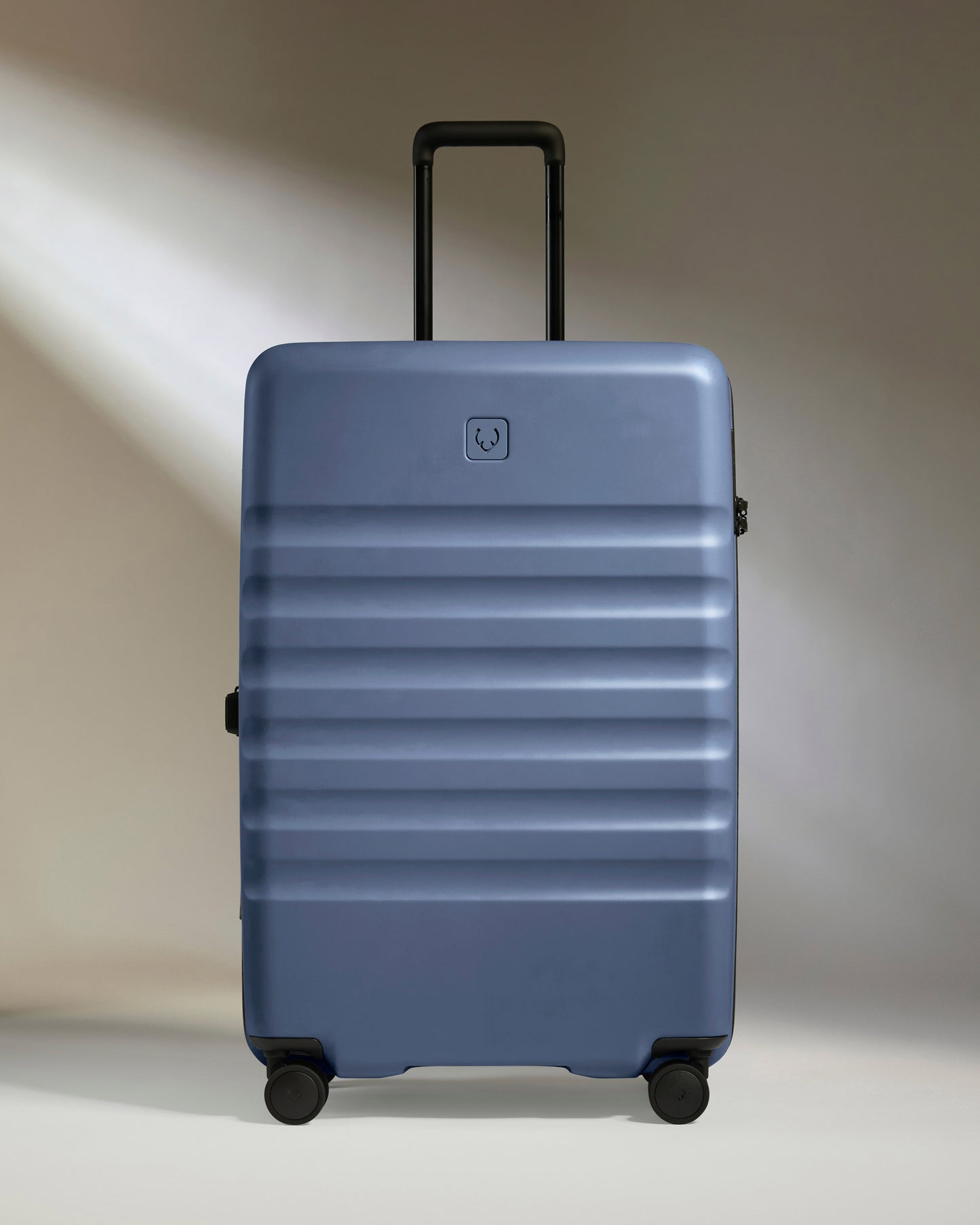 Large Suitcase in Ocean Blue - Icon Stripe