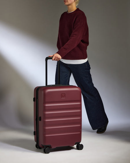 Medium Suitcase in Cedar Red - Icon Stripe