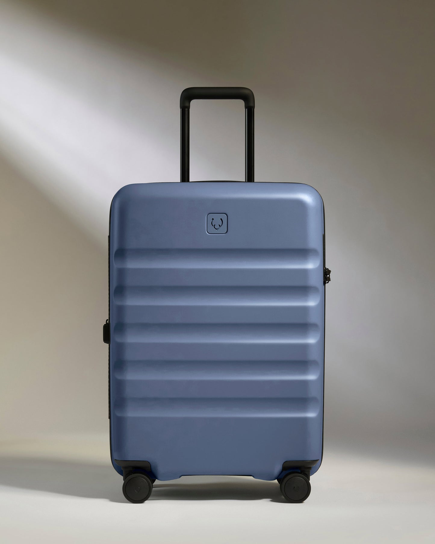 Medium Suitcase in Ocean Blue - Icon Stripe