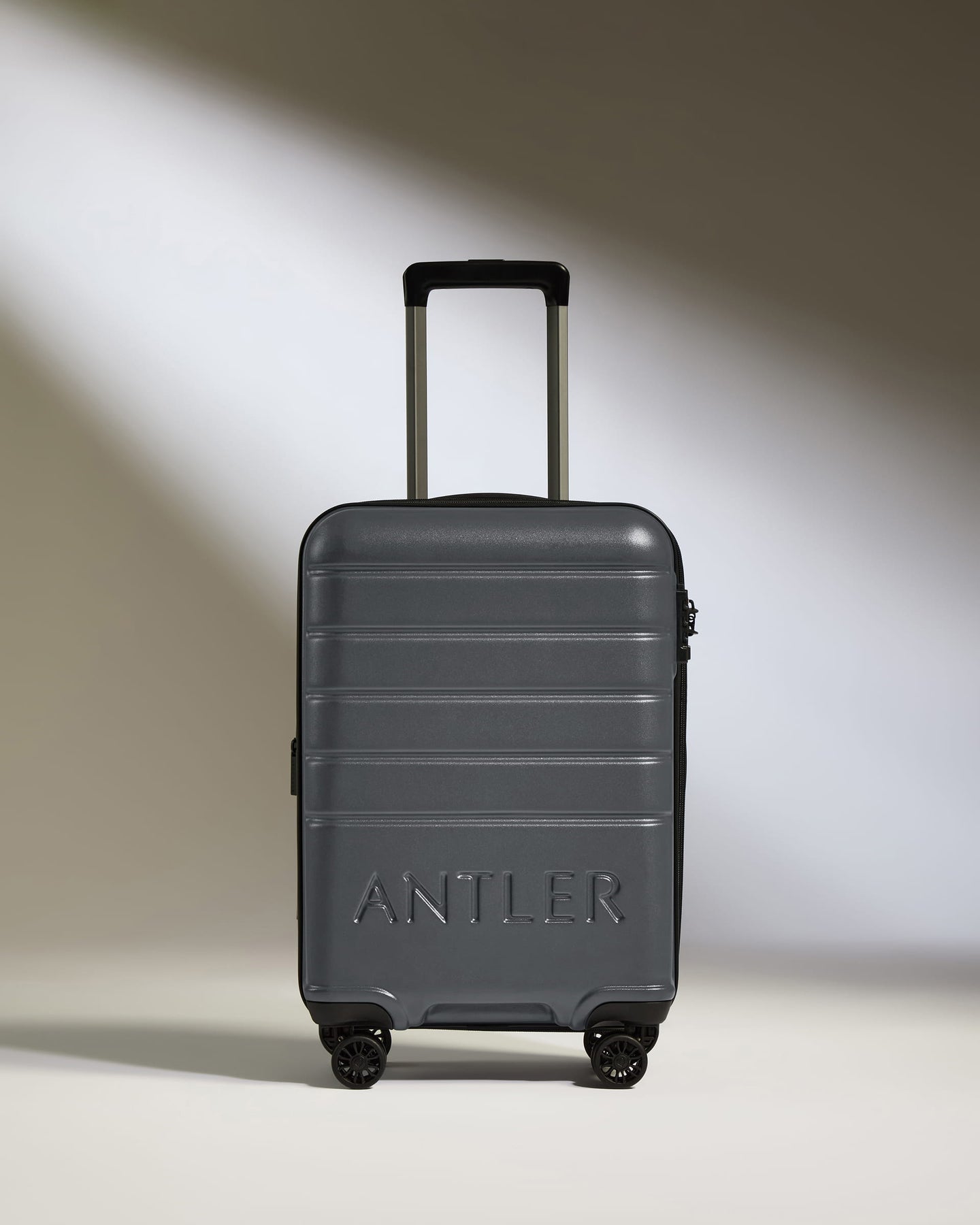 Expandable Cabin Suitcase in Granite - Logo