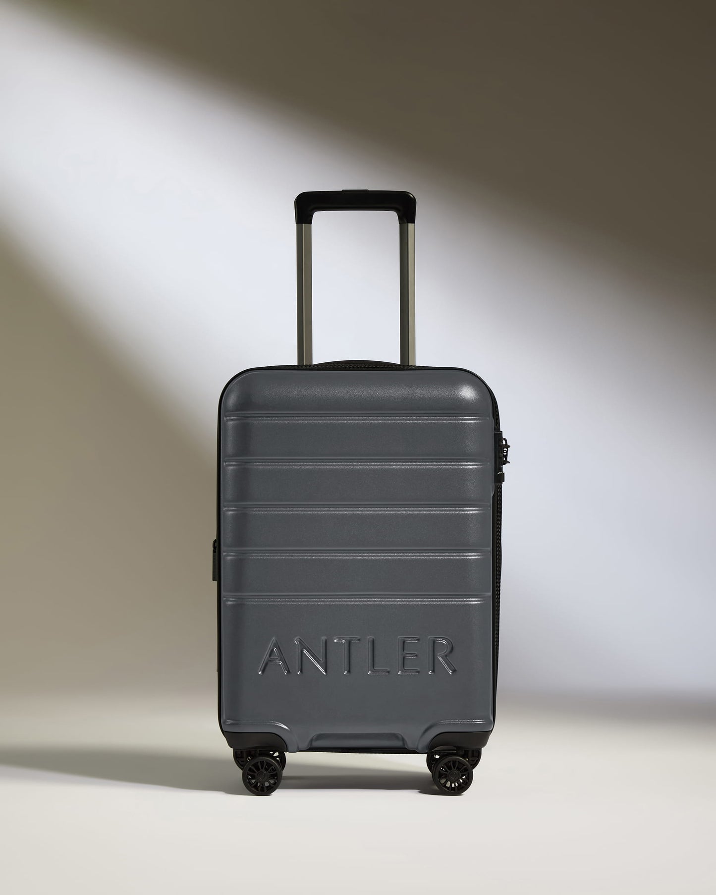 Expandable Cabin Suitcase in Granite - Logo