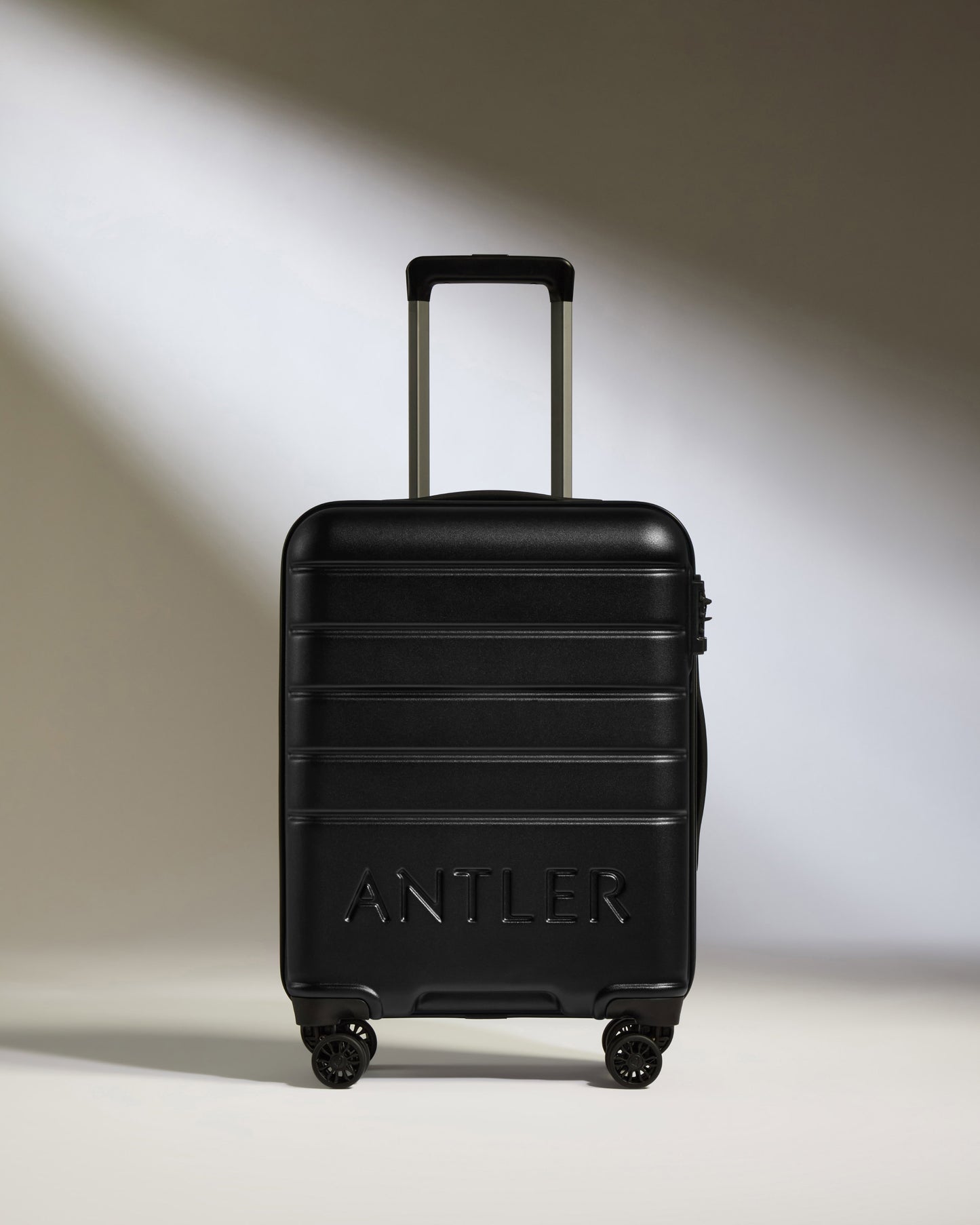 Cabin Suitcase in Black - Logo