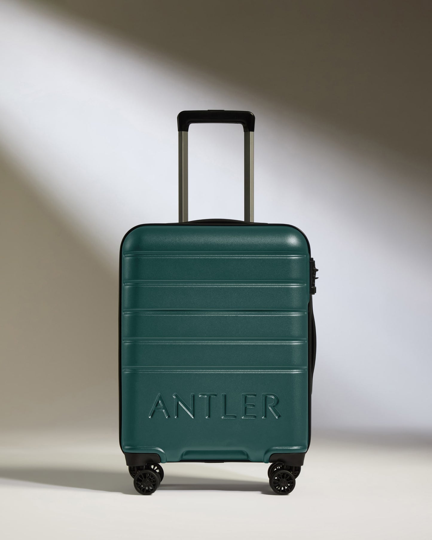 Cabin Suitcase in Dark Teal - Logo