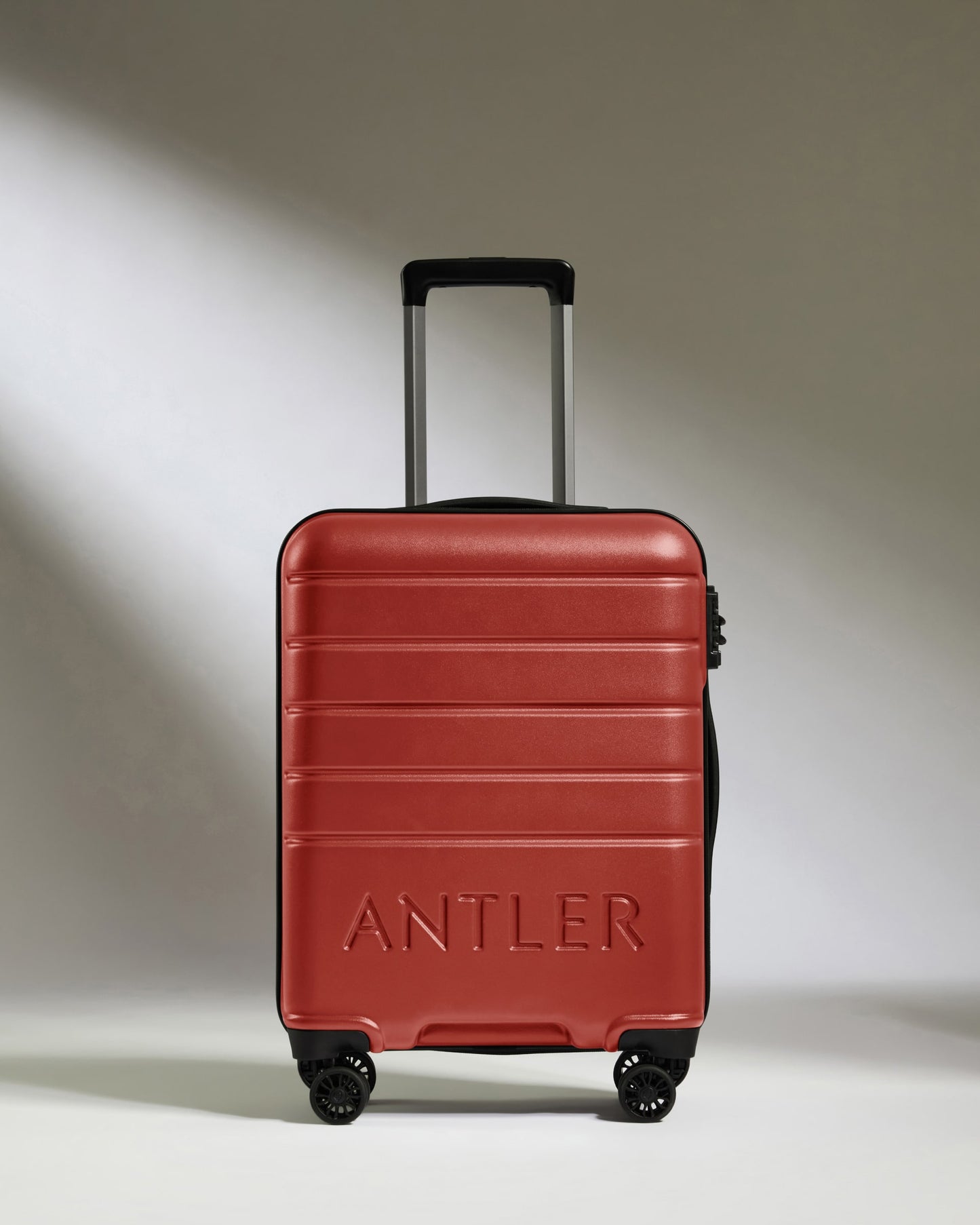 Cabin Suitcase in Red Orange - Logo