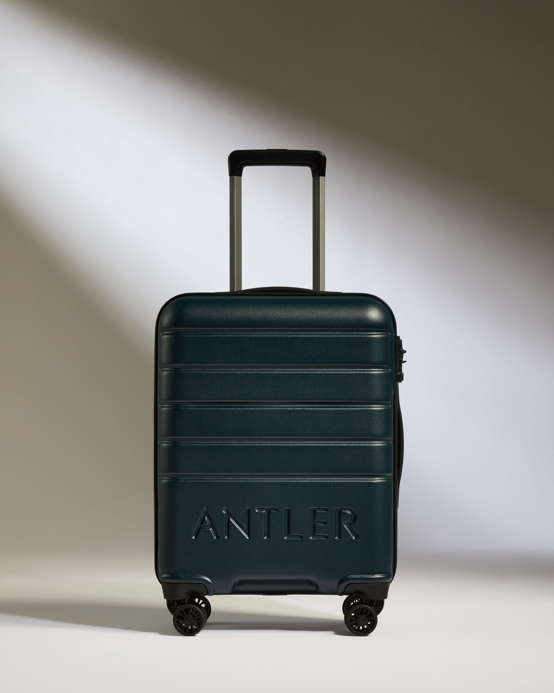 a suitcase with wheels and handle