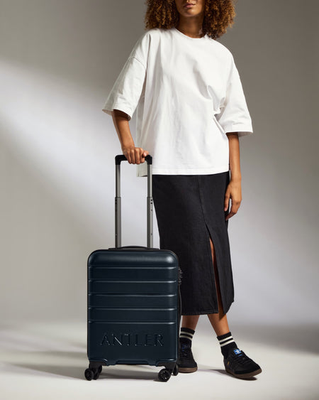 Cabin Suitcase in Dark Navy - Logo