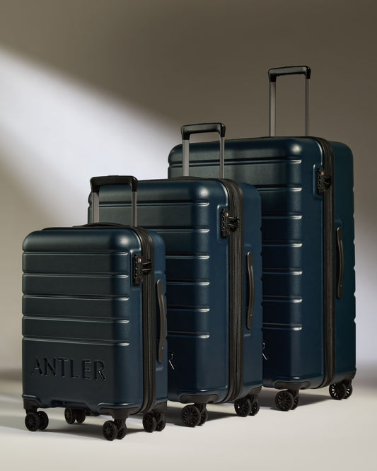 a group of luggage on wheels