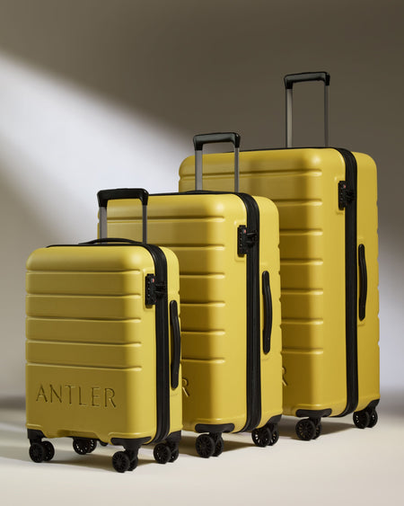 Suitcase Set in Mustard Yellow - Logo