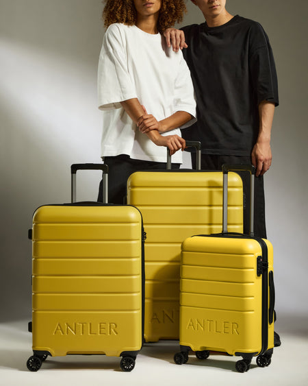 Suitcase Set in Mustard Yellow - Logo