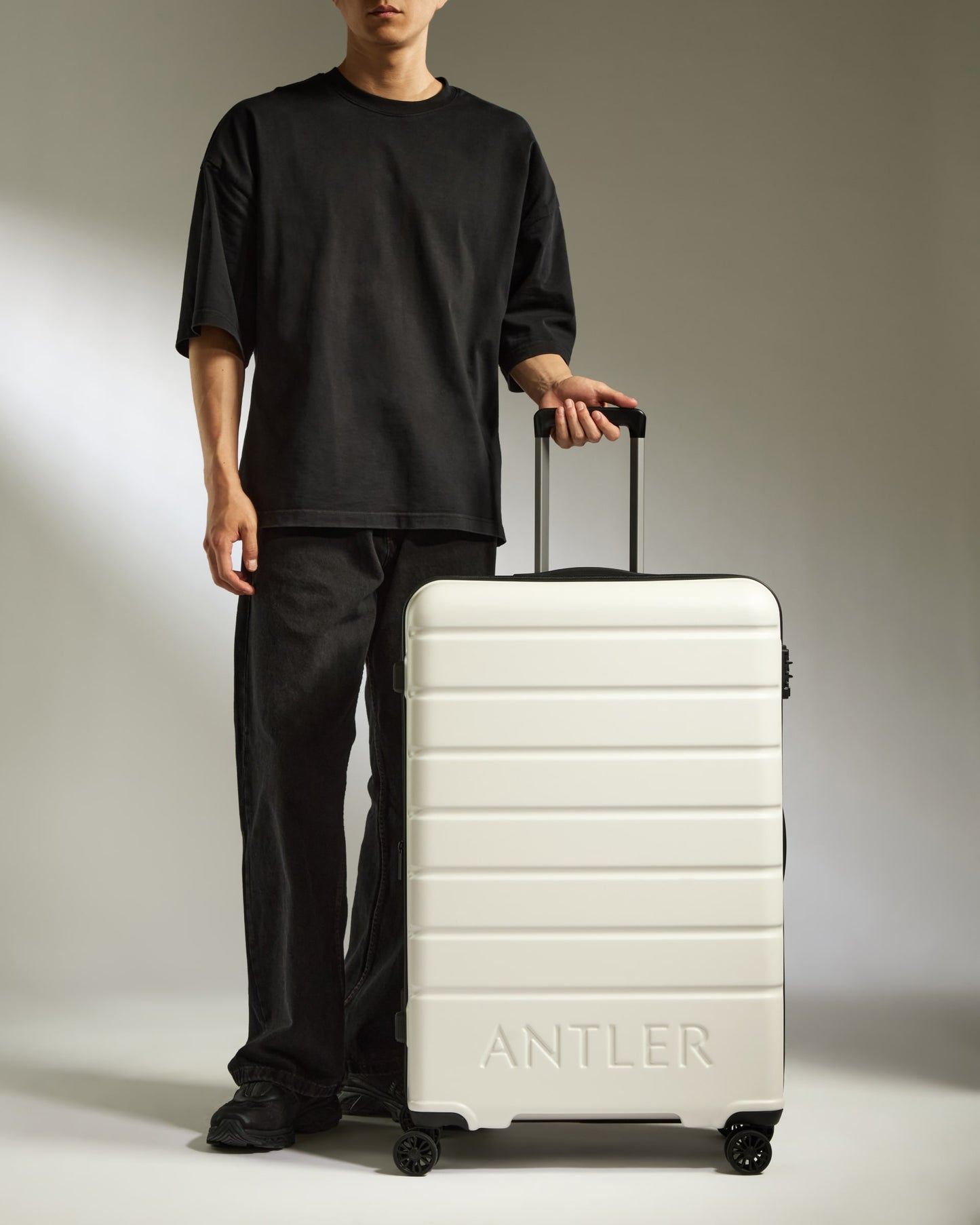 Large Suitcase in Arctic White - Logo