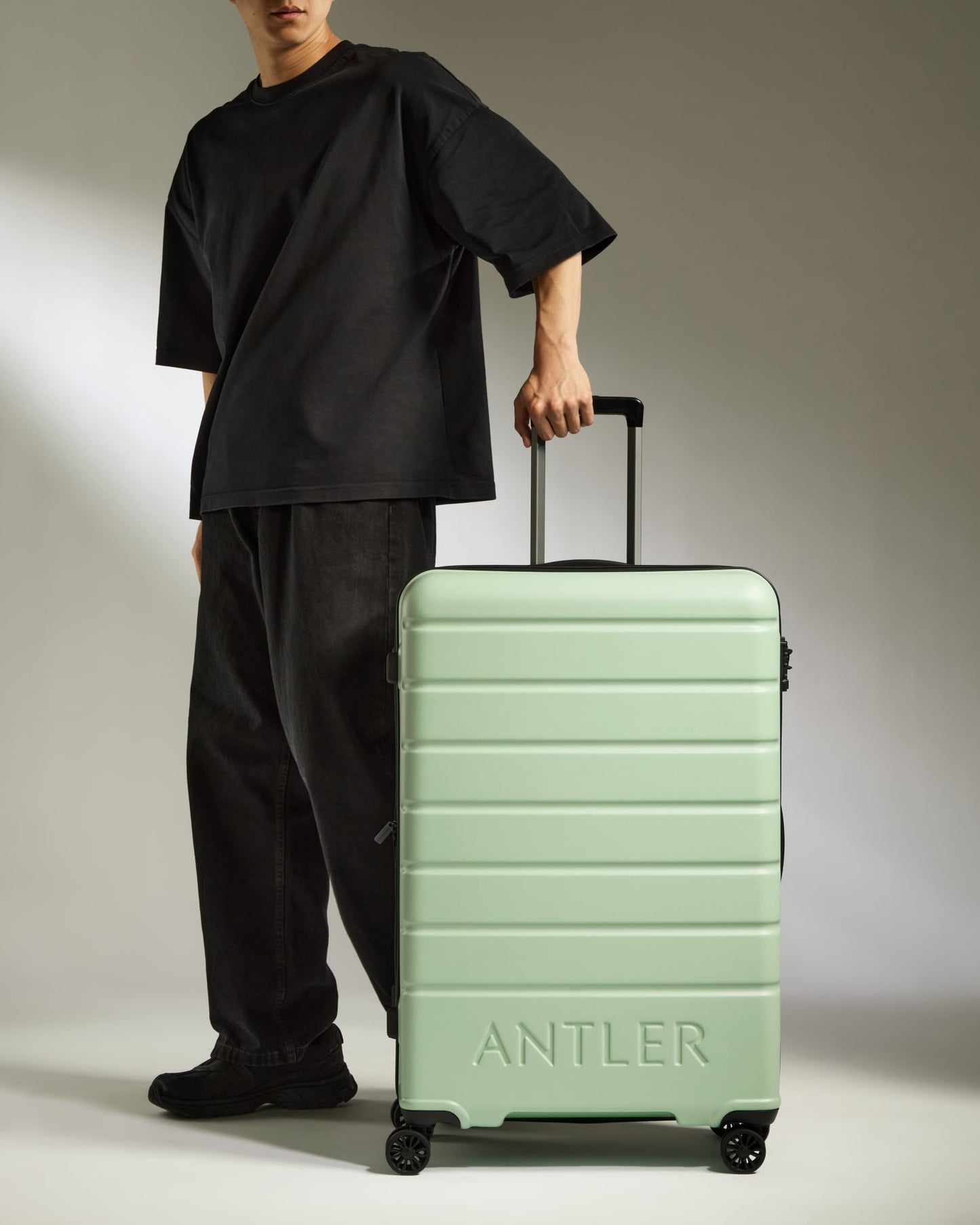 Large Suitcase in Aspen Green - Logo