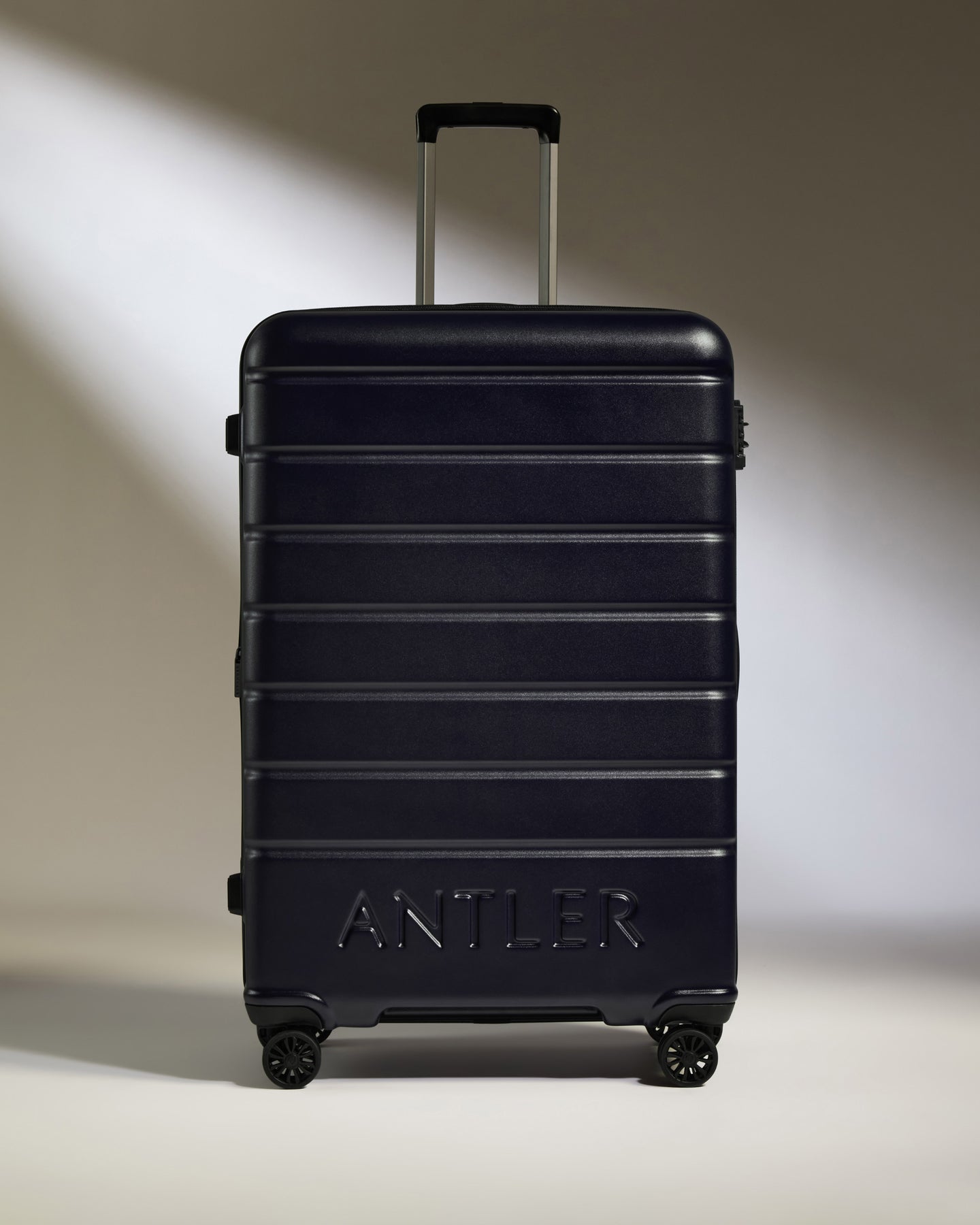 Large Suitcase in Dark Purple - Logo