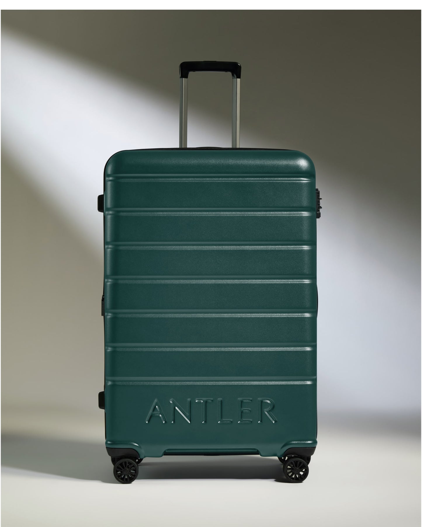 Large Suitcase in Dark Teal - Logo