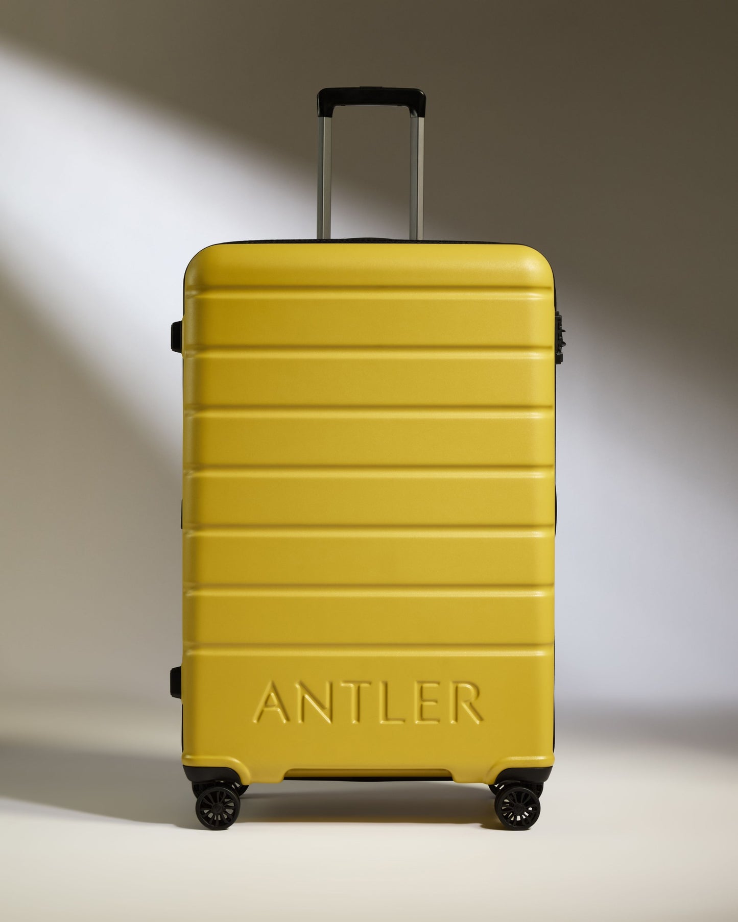 Large Suitcase in Mustard Yellow - Logo