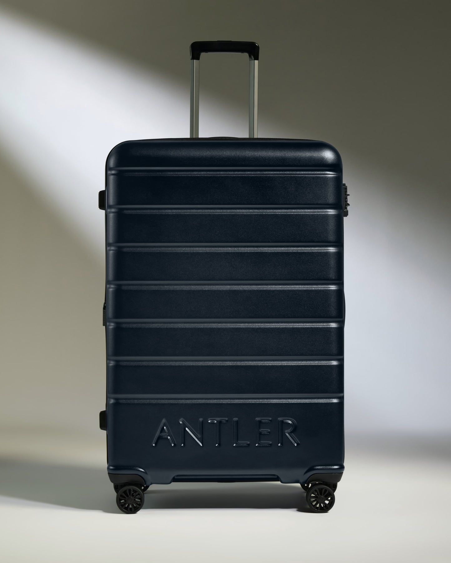 Large Suitcase in Dark Navy - Logo