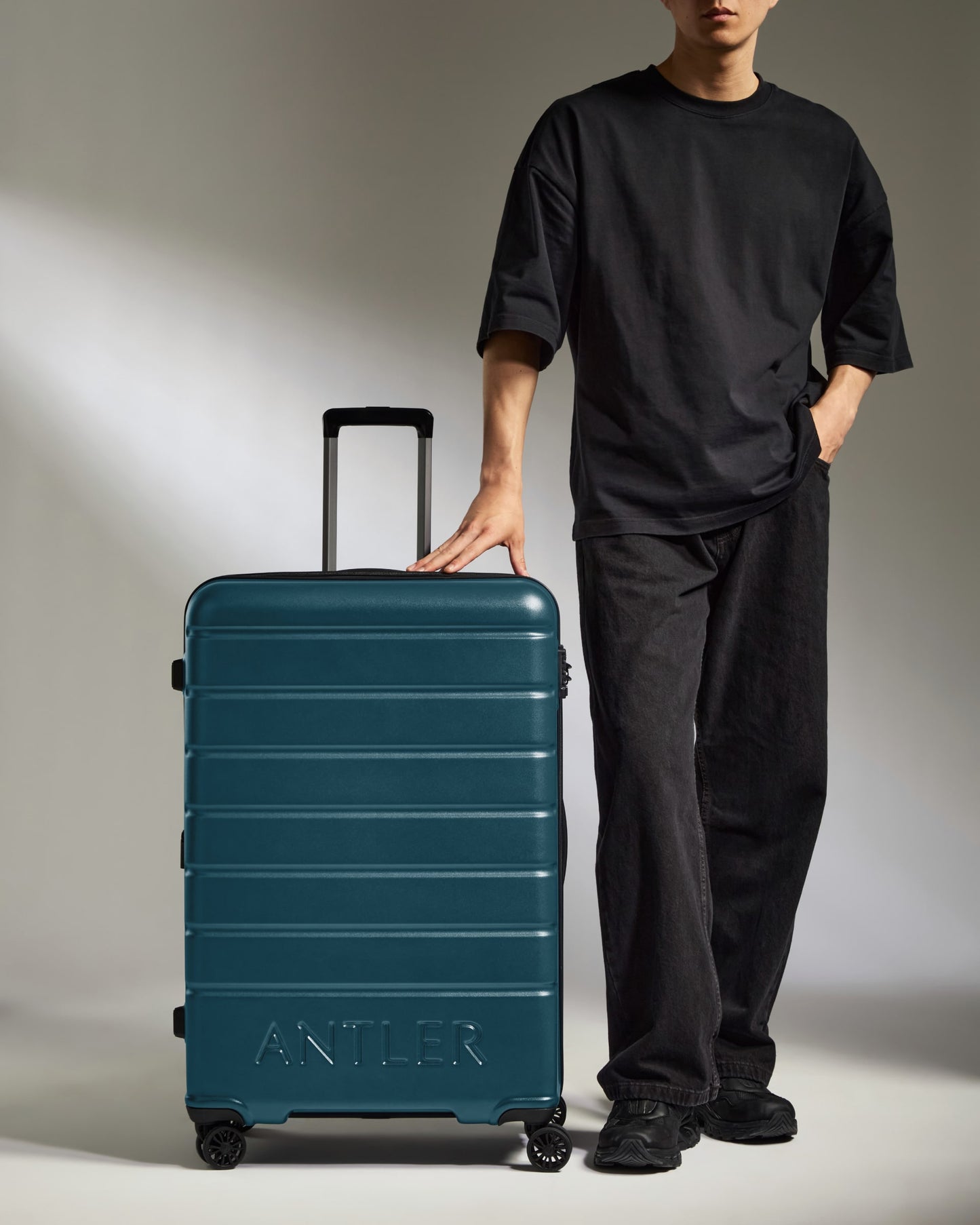 Large Suitcase in Soft Blue - Logo