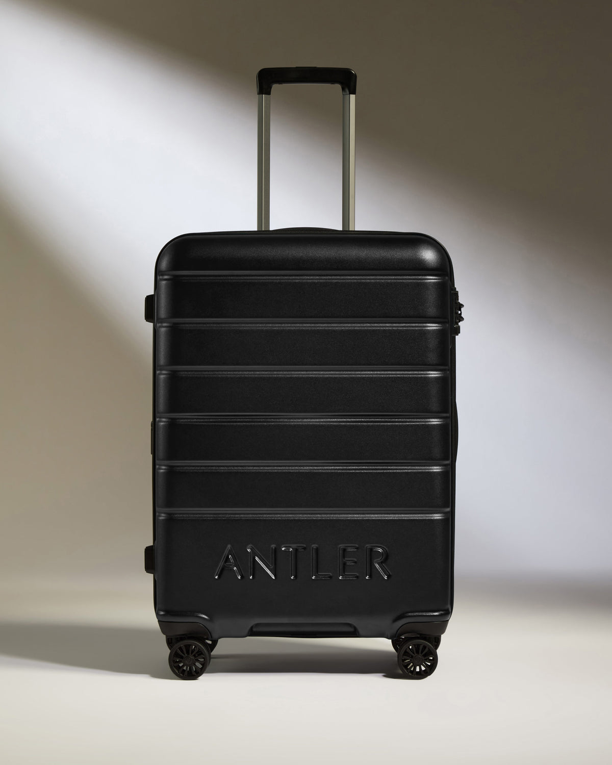 a black suitcase with handle