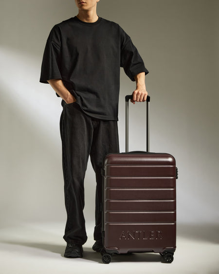 Medium Suitcase in Cedar Brown - Logo