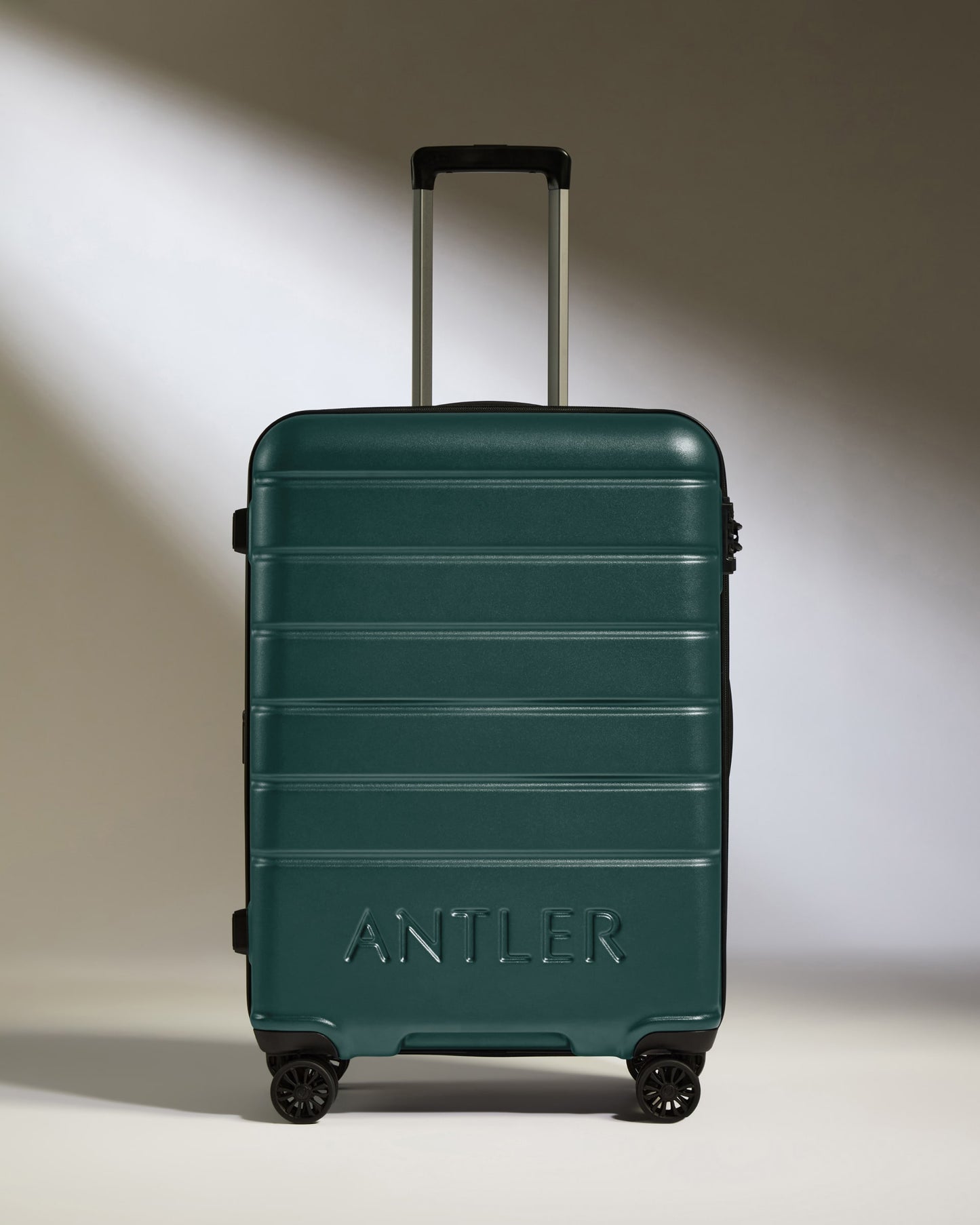 Medium Suitcase in Dark Teal - Logo