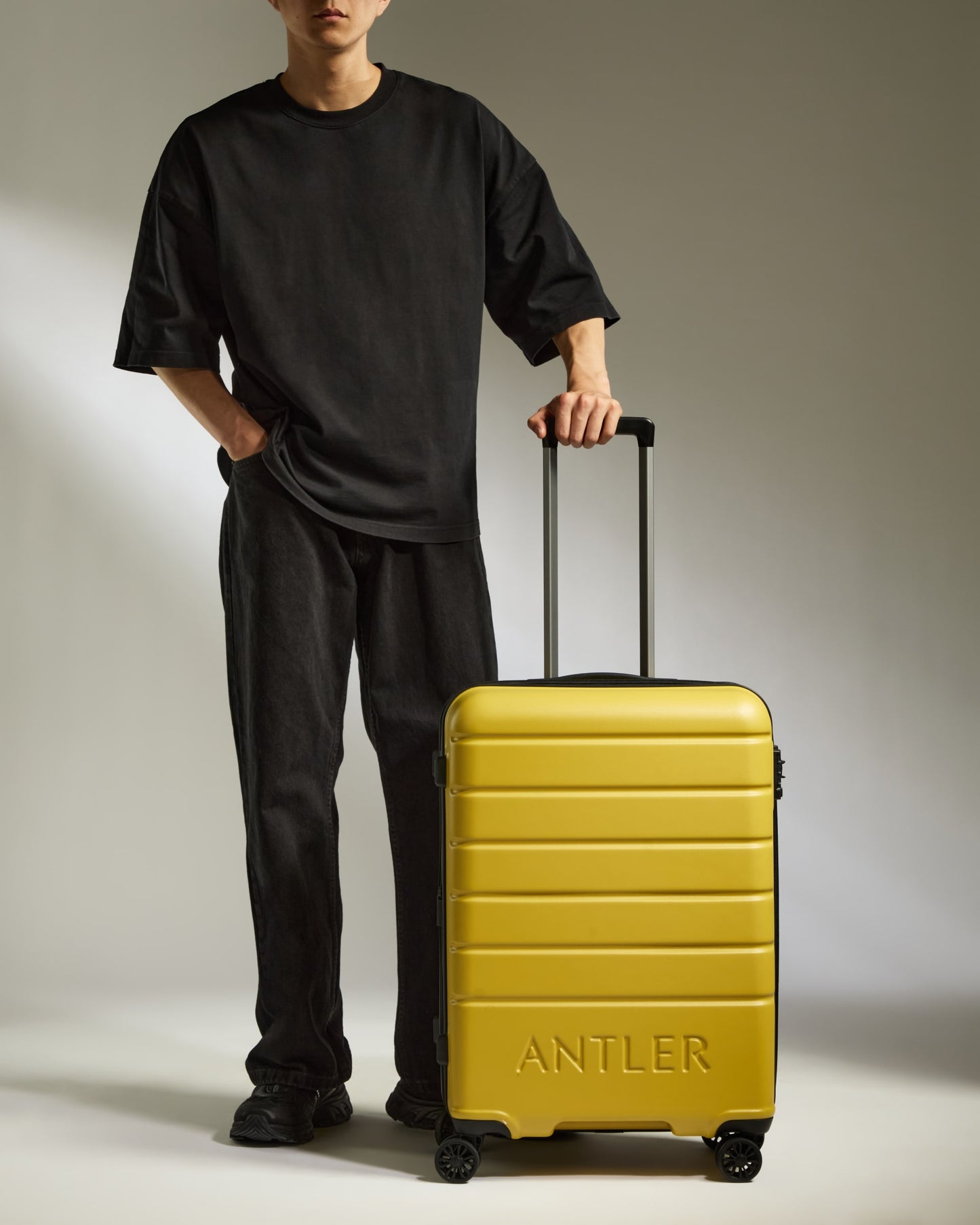 Medium Suitcase in Mustard Yellow - Logo