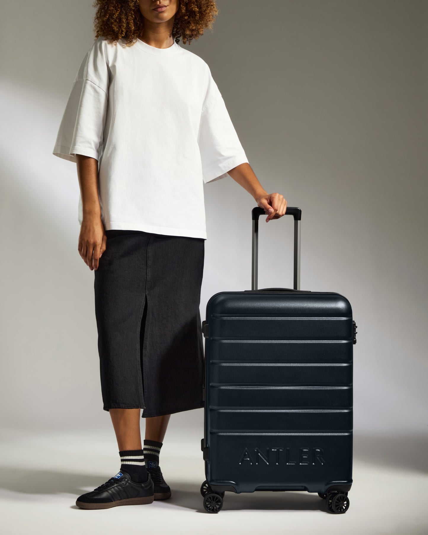 Medium Suitcase in Dark Navy - Logo