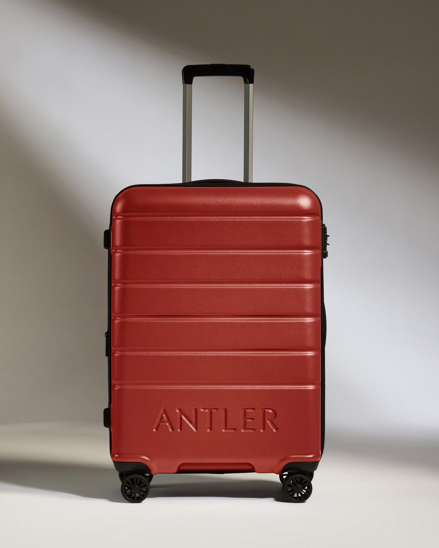Medium Suitcase in Red Orange - Logo