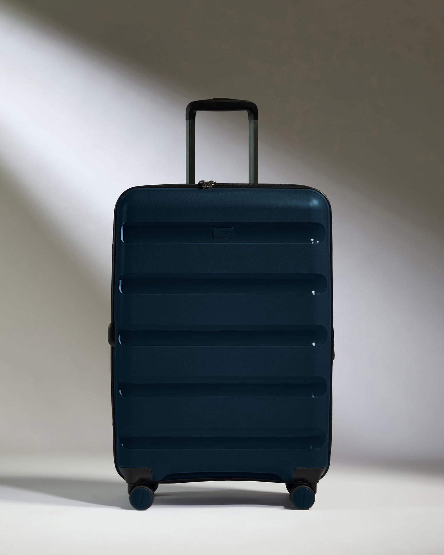 Medium Suitcase in Midnight Blue - Logo Stripe