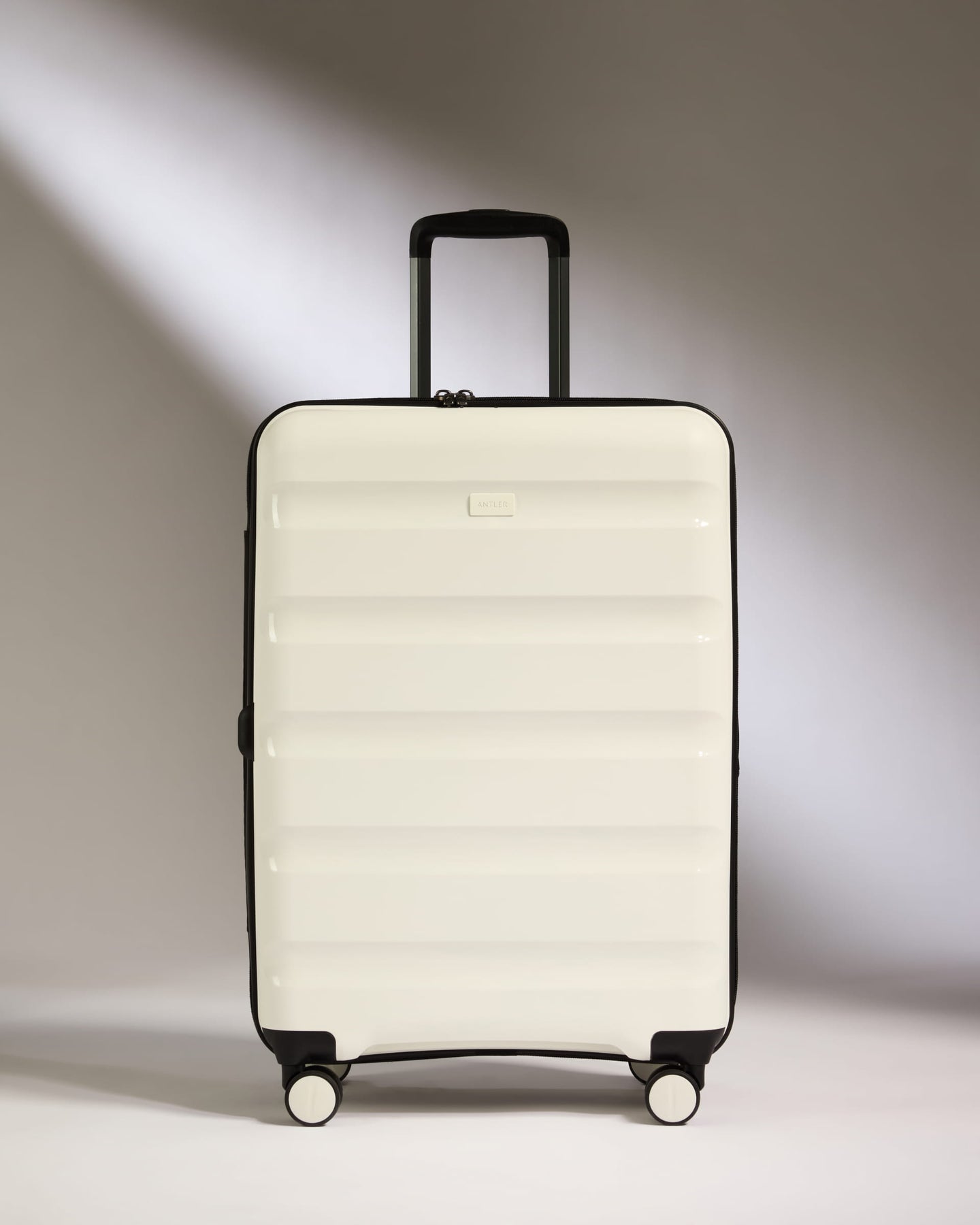 Medium Suitcase in White - Logo Stripe