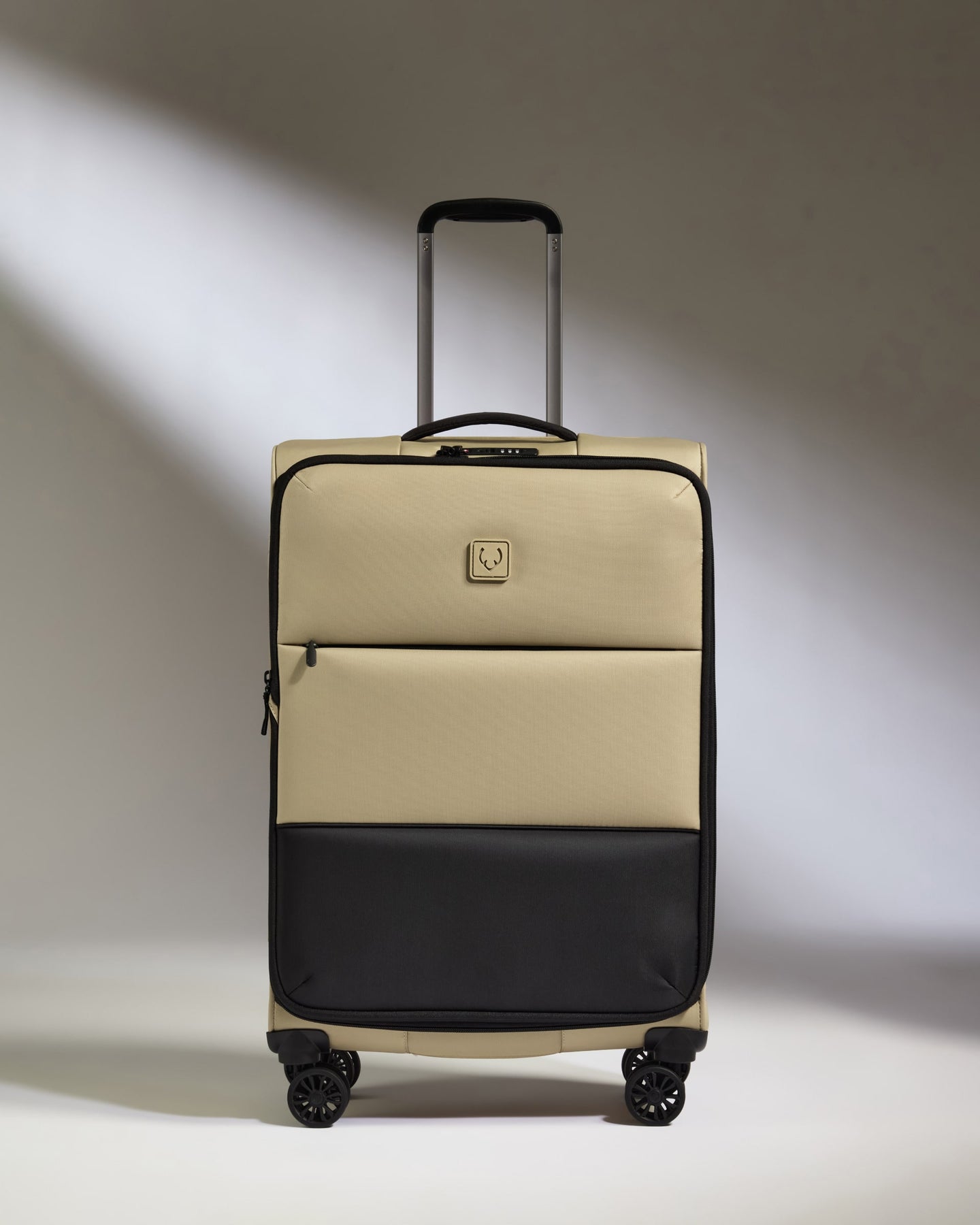 Lightest Medium Suitcase in Sand - Soft Stripe 2.0