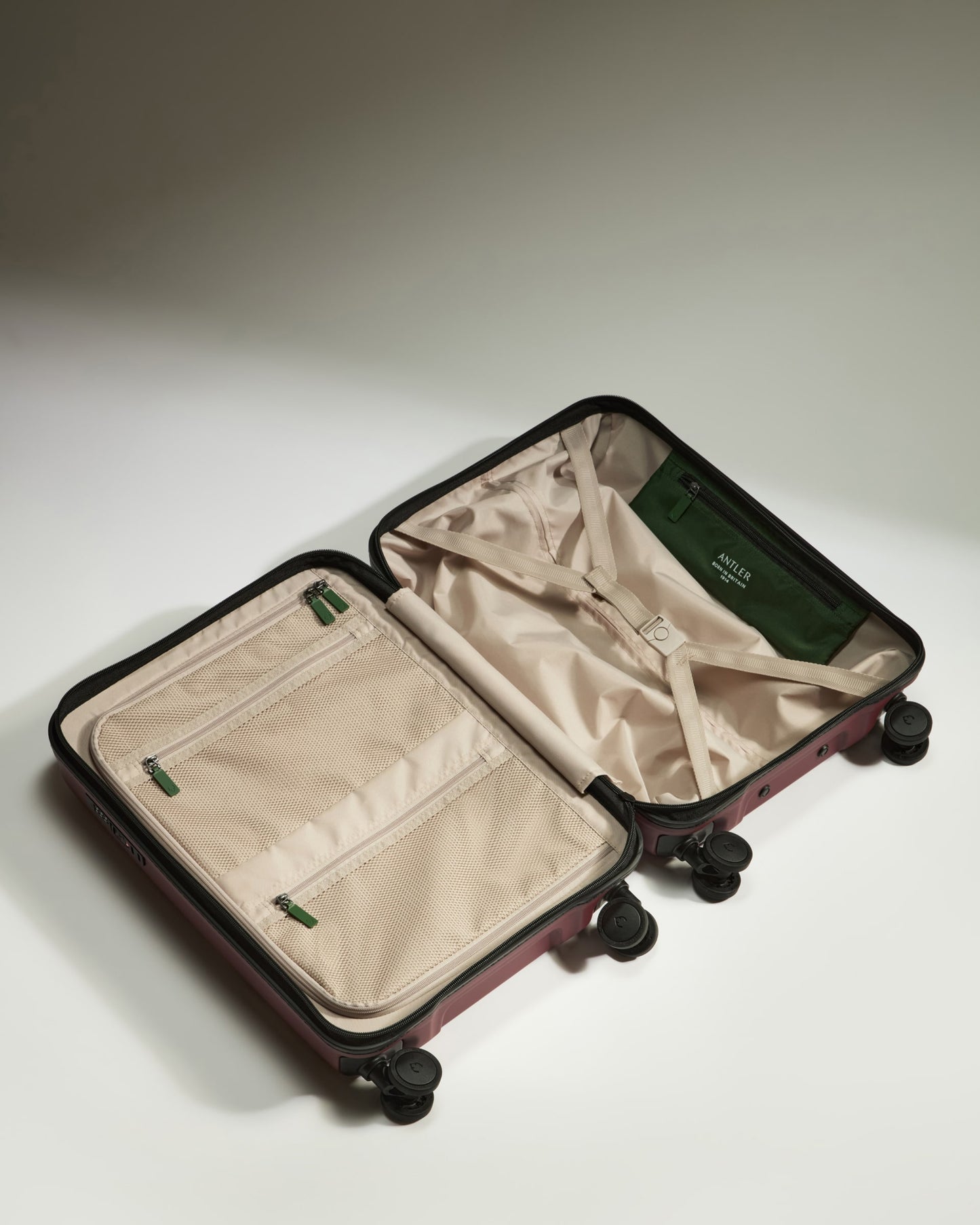 Cabin Suitcase in Cedar Red - Icon Stripe