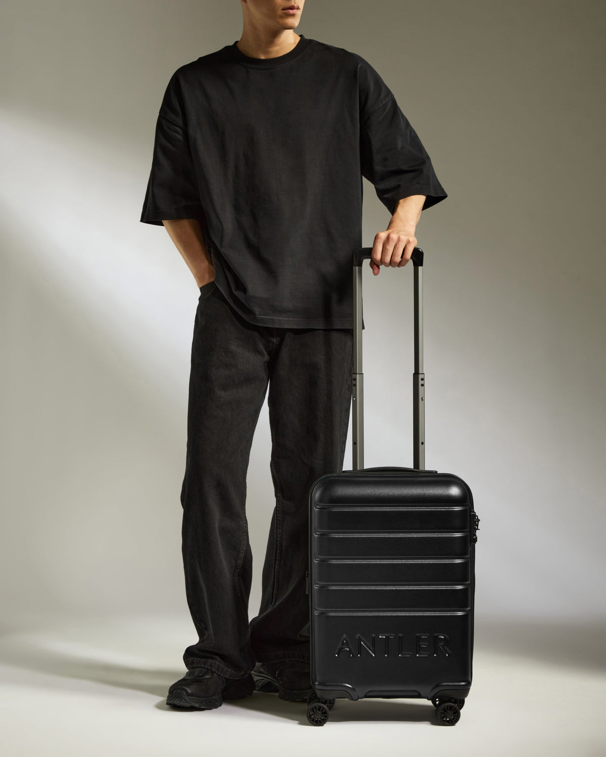 Cabin Suitcase in Black - Logo