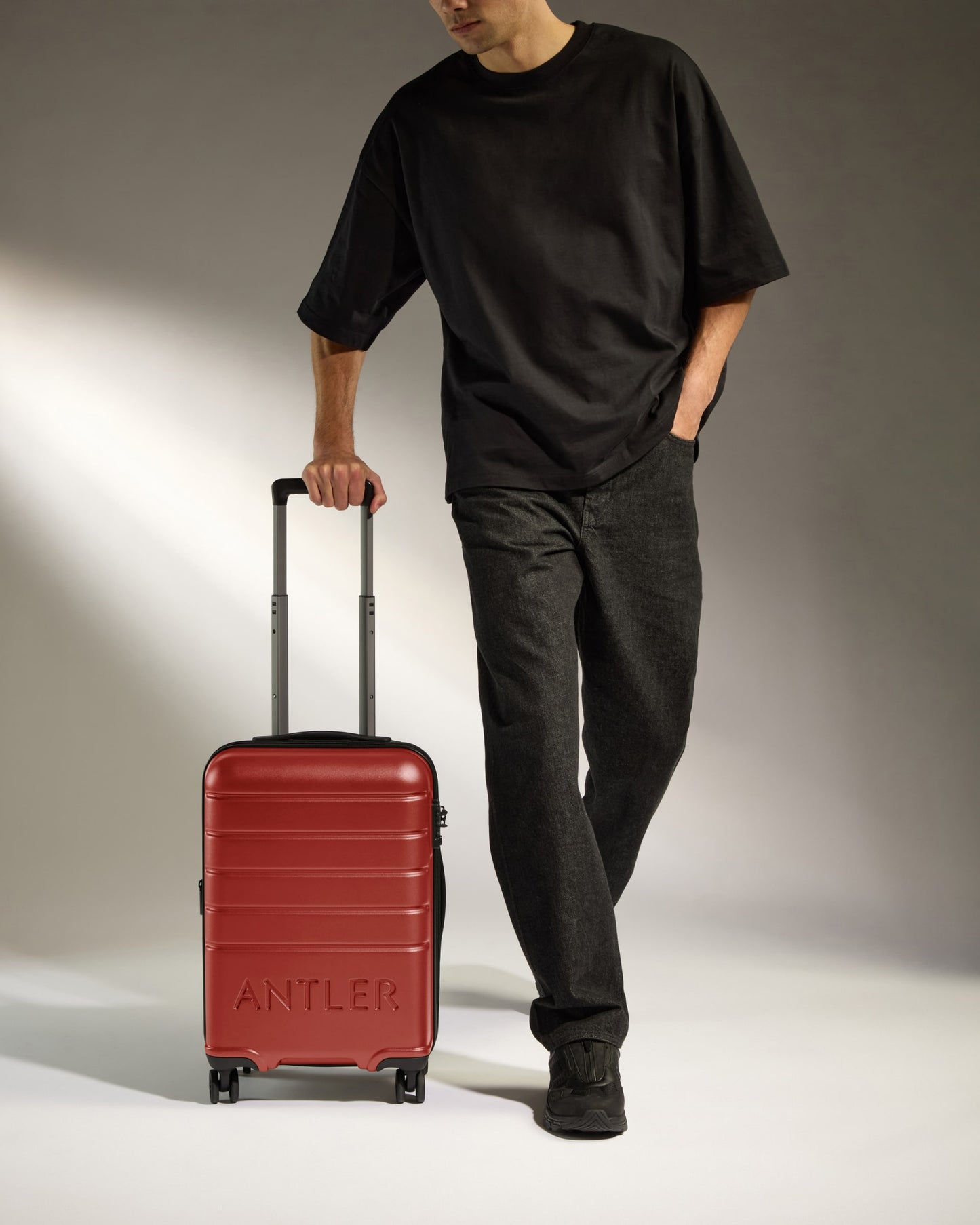 Cabin Suitcase in Red Orange - Logo