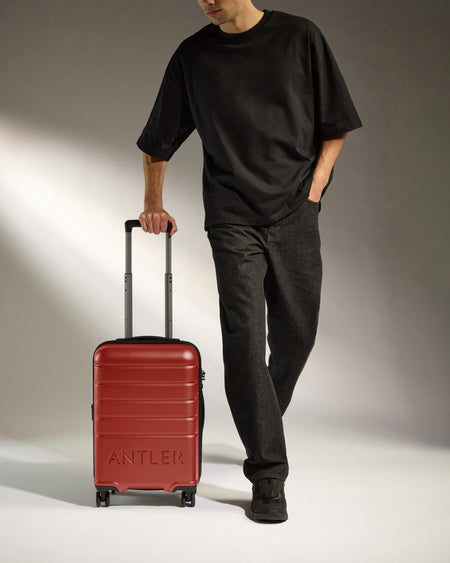 Cabin Suitcase in Red Orange - Logo