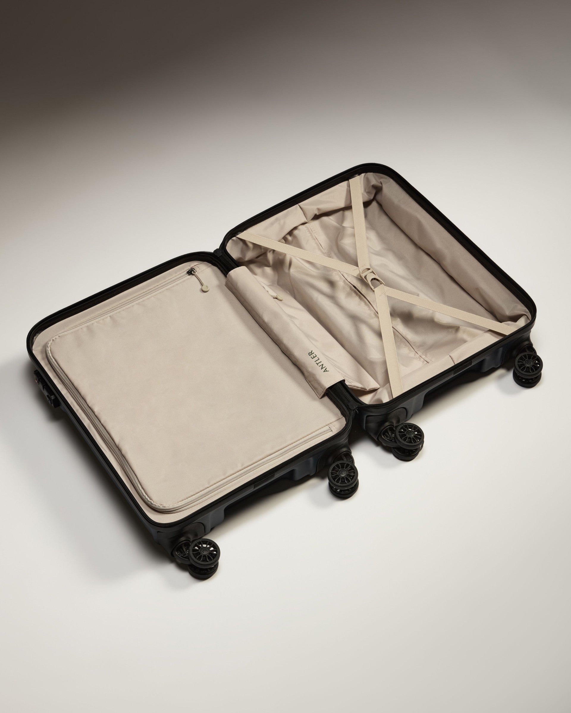 a suitcase with wheels and a lid