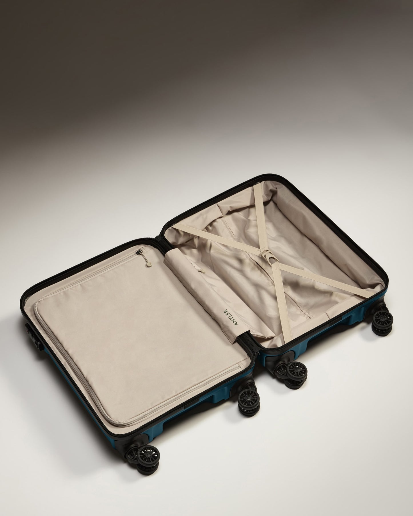 Cabin Suitcase in Soft Blue - Logo