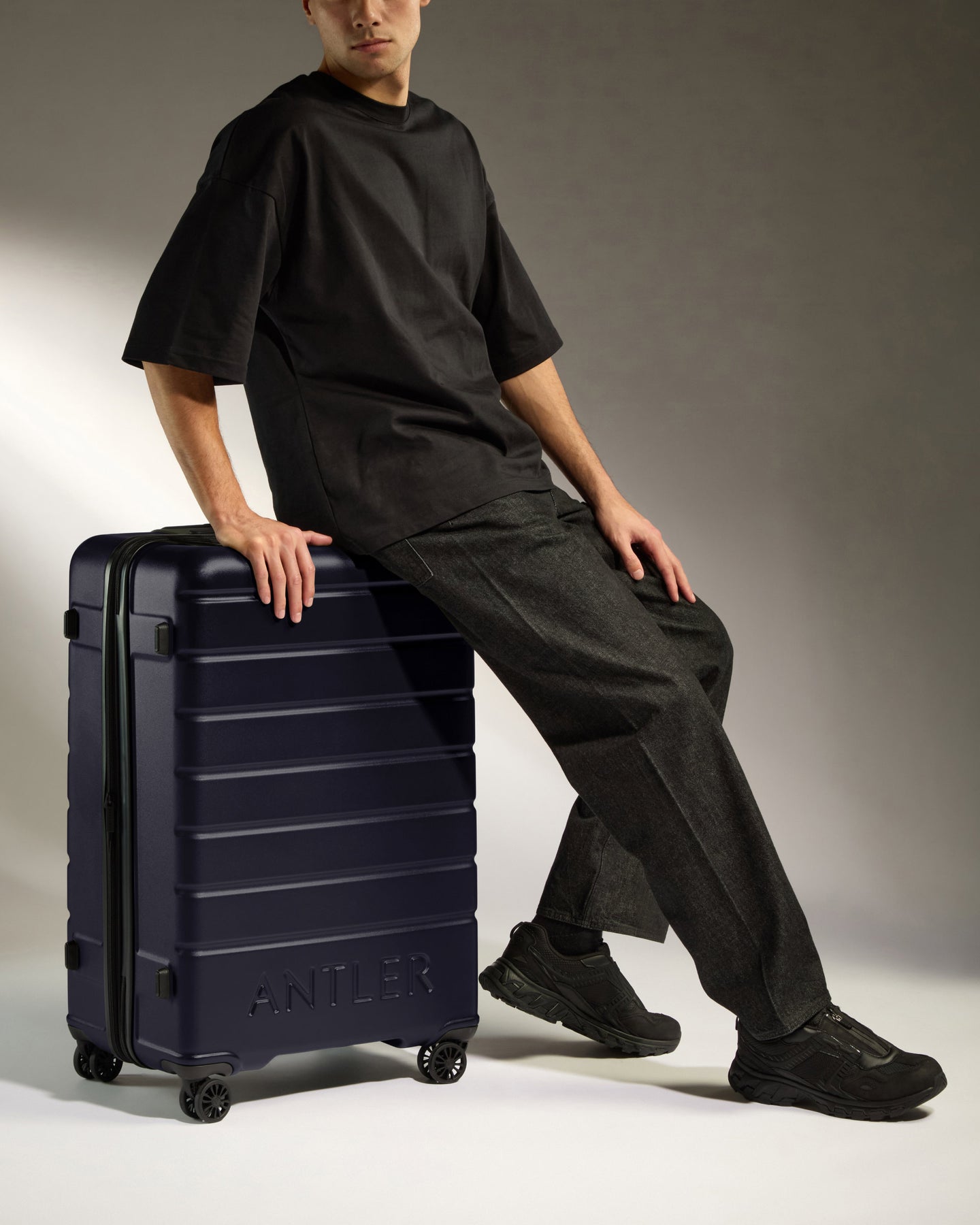 Large Suitcase in Dark Purple - Logo