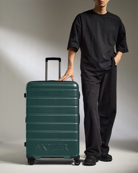 Large Suitcase in Dark Teal - Logo