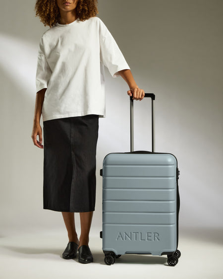 Medium Suitcase in Cool Grey - Logo