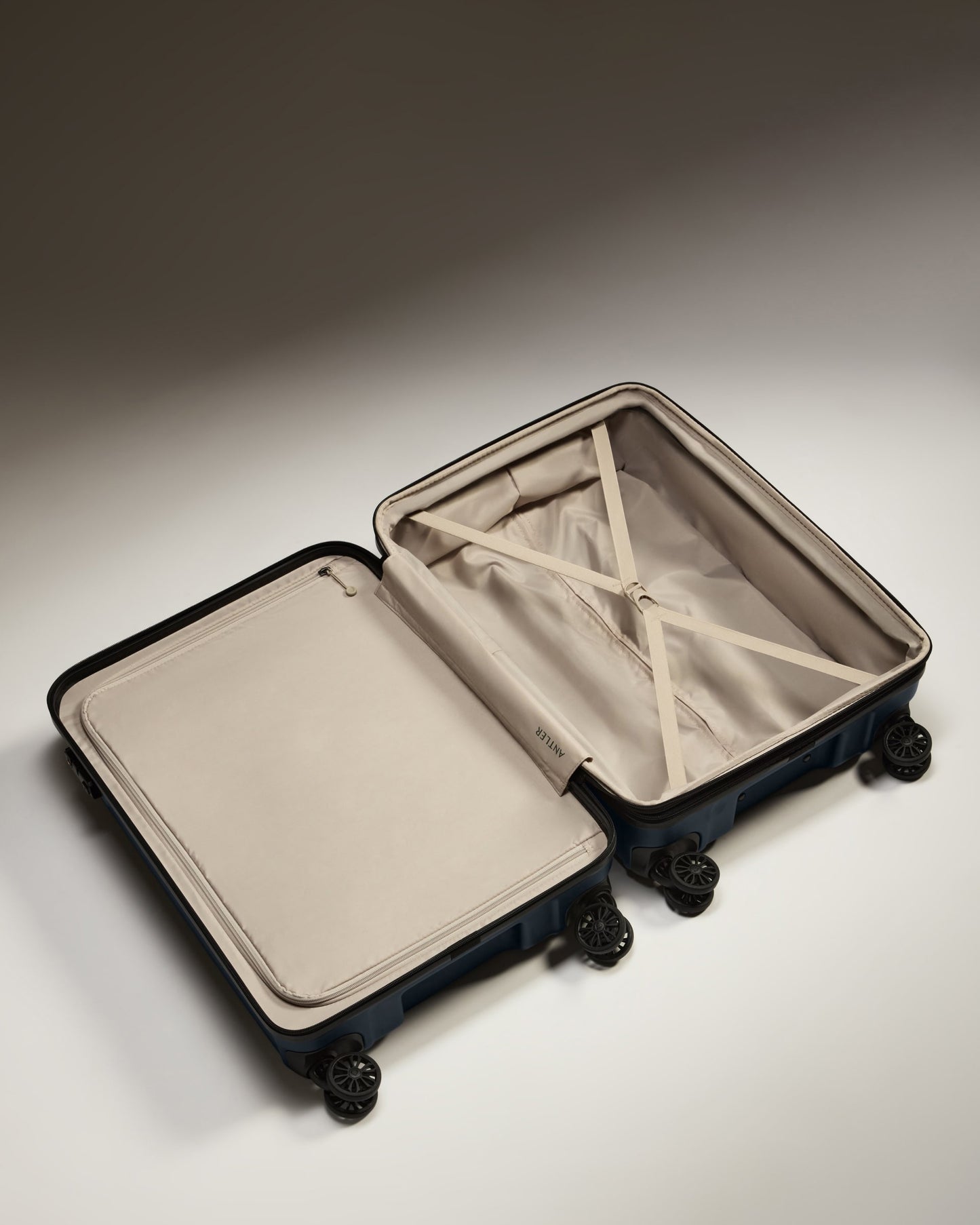 Medium Suitcase in Dark Navy - Logo