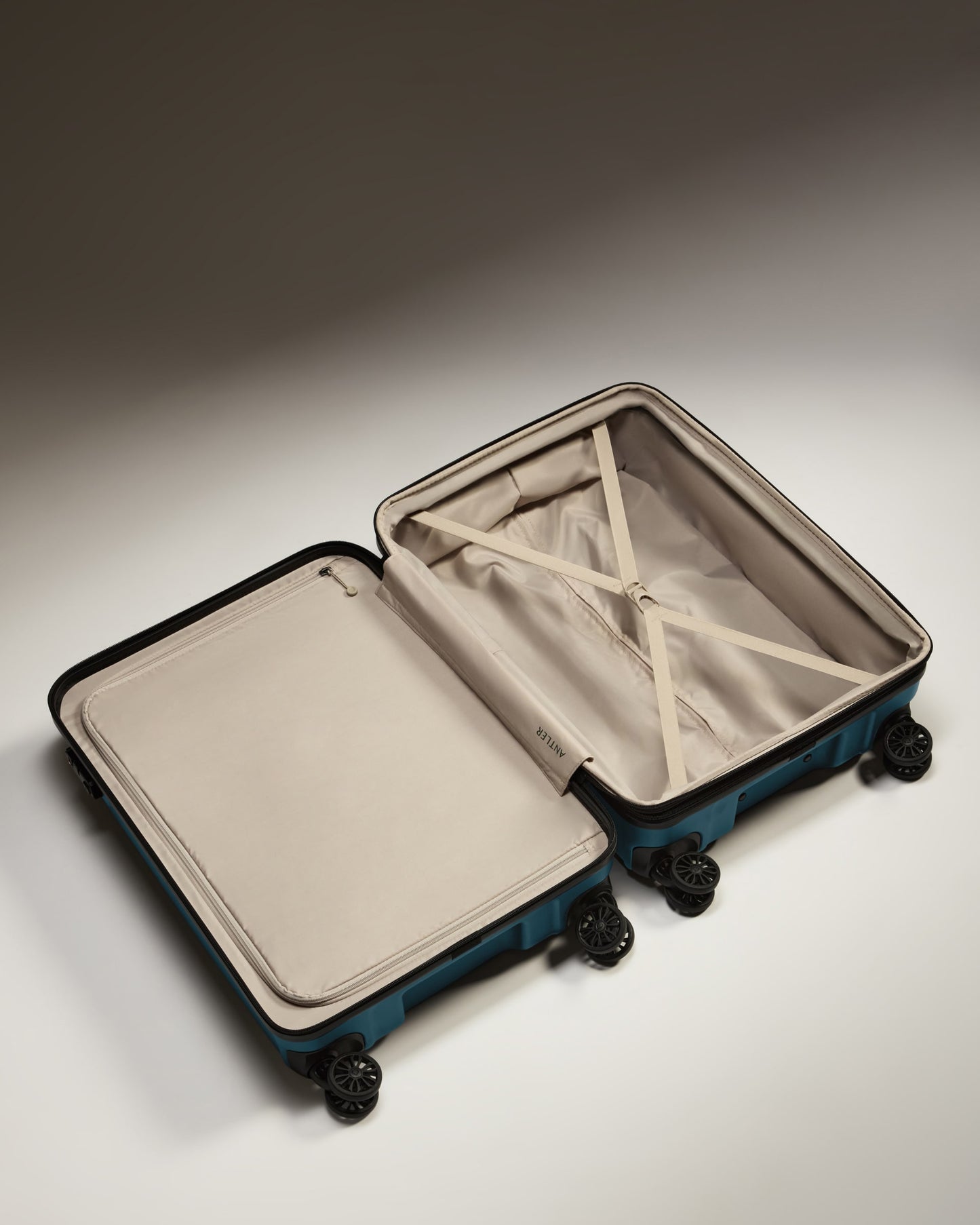 Medium Suitcase in Soft Blue - Logo